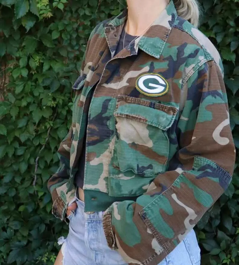 Unique game day outfit made from upcycled sports jerseys and thrifted military jacket